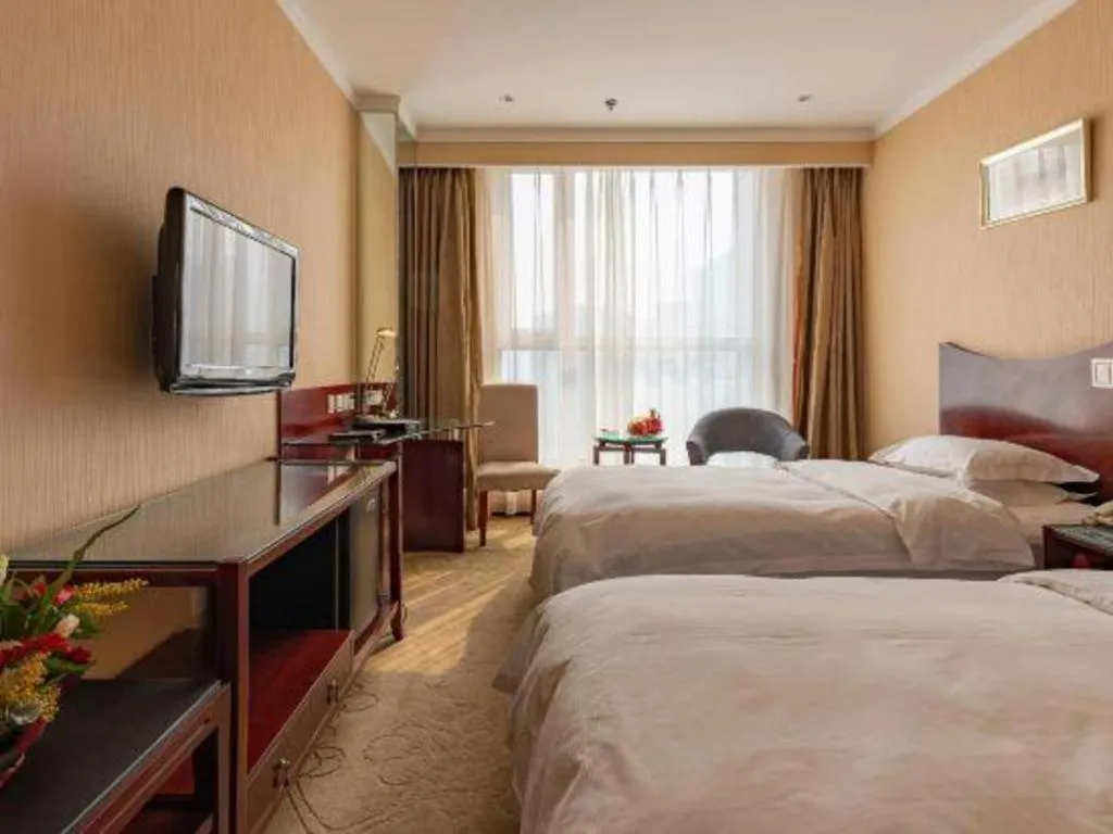 Bed in YUN-RAY Ambassador Hotel