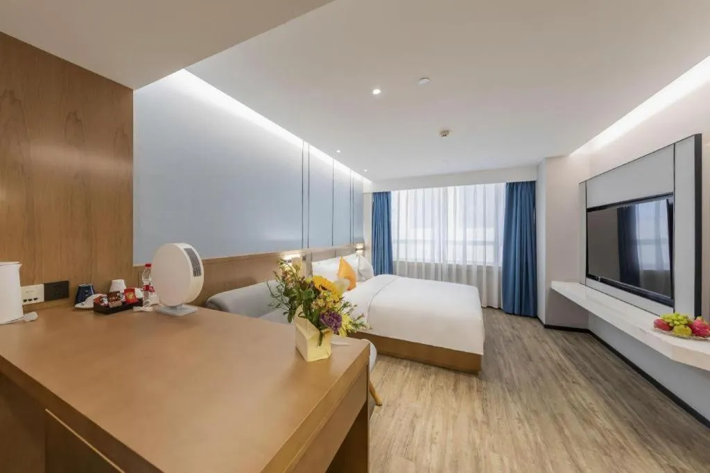 Bed in YUN-RAY Ambassador Hotel