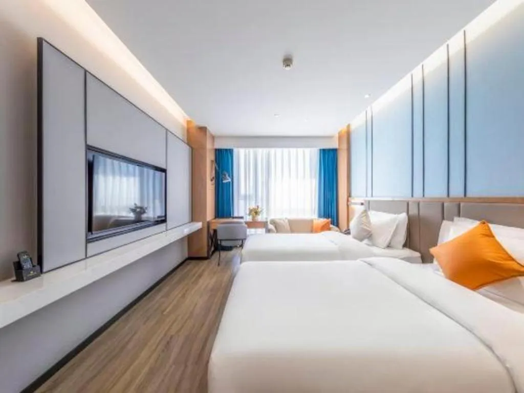 Bed in YUN-RAY Ambassador Hotel