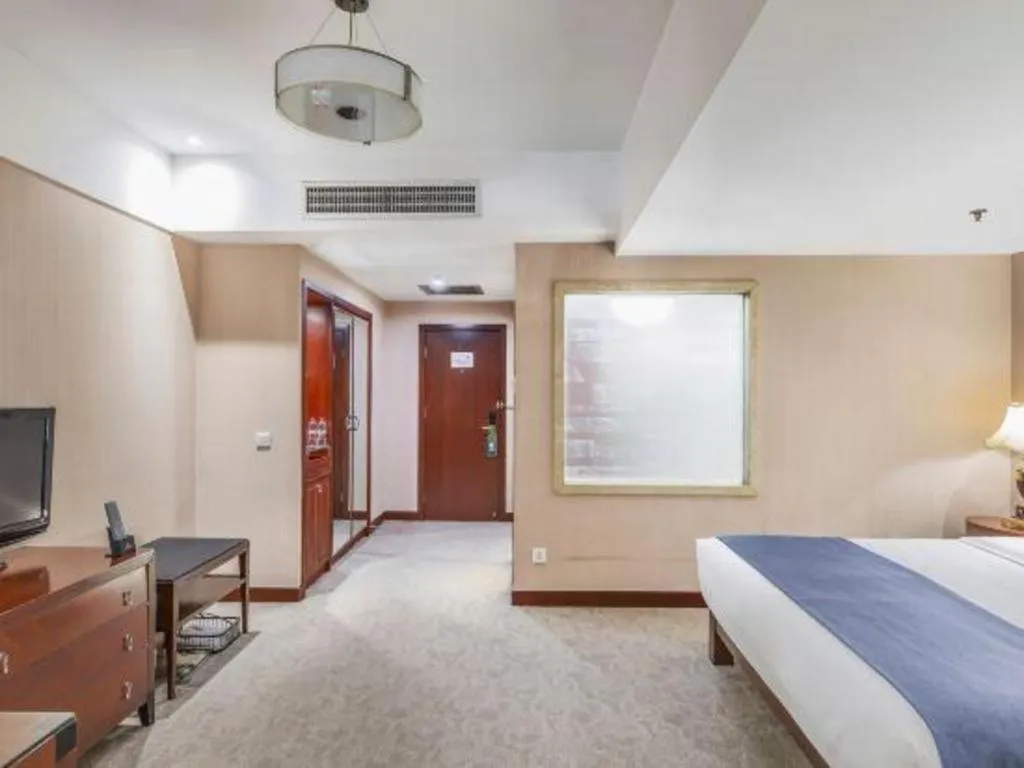 Bed in YUN-RAY Ambassador Hotel