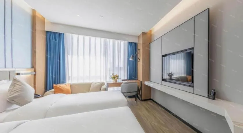 Bed in YUN-RAY Ambassador Hotel