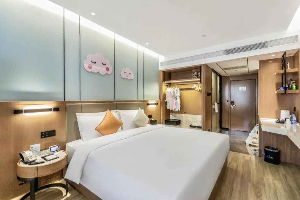 Bed in YUN-RAY Ambassador Hotel