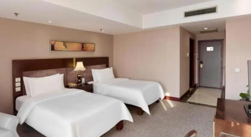 Bed in YUN-RAY Ambassador Hotel