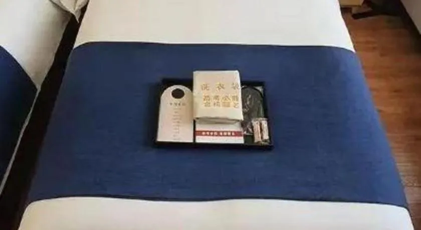 Bed in YUN-RAY Ambassador Hotel