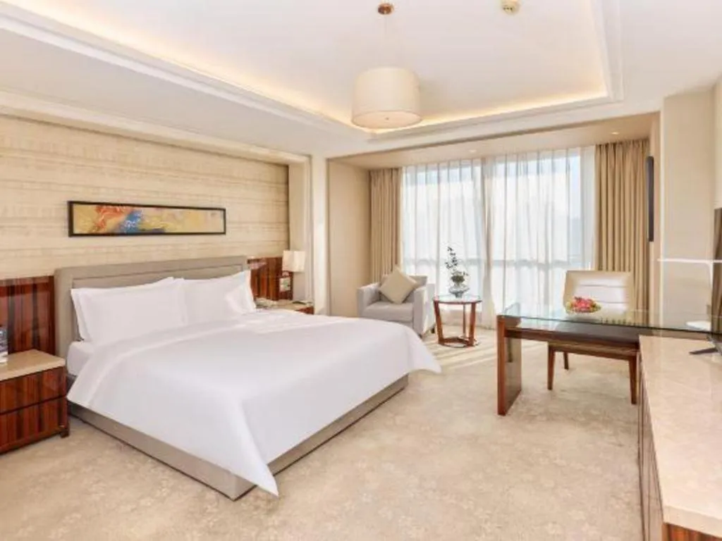 Bed in YUN-RAY Ambassador Hotel