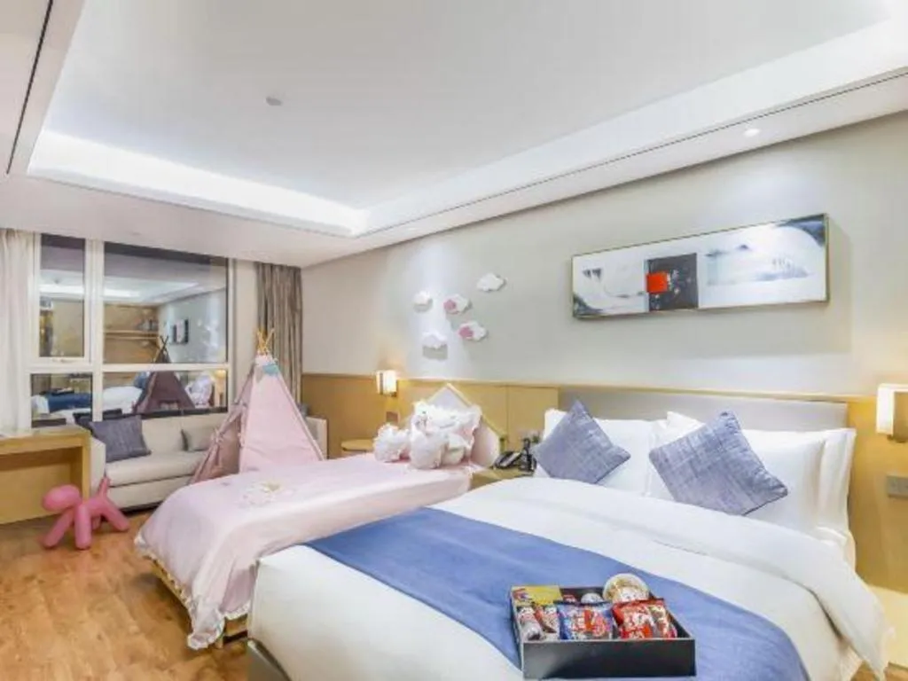 Bed in YUN-RAY Ambassador Hotel