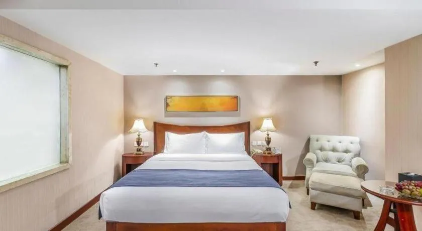 Bed in YUN-RAY Ambassador Hotel