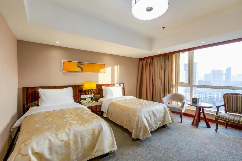 Bed in YUN-RAY Ambassador Hotel