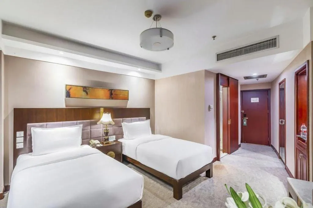 Bed in YUN-RAY Ambassador Hotel