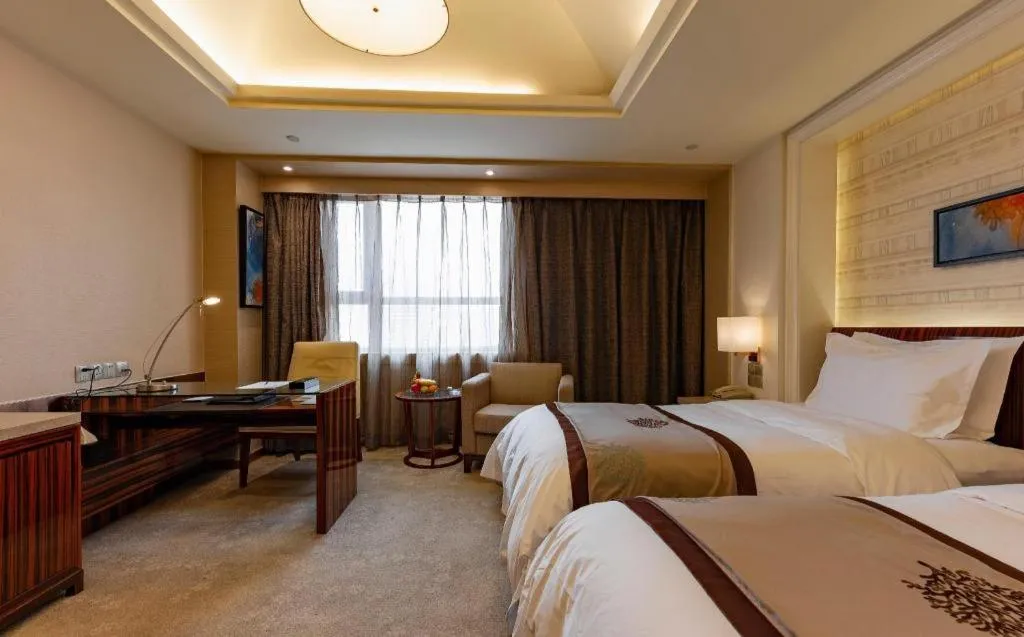 Bed in YUN-RAY Ambassador Hotel