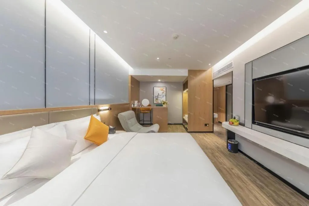 Bed in YUN-RAY Ambassador Hotel