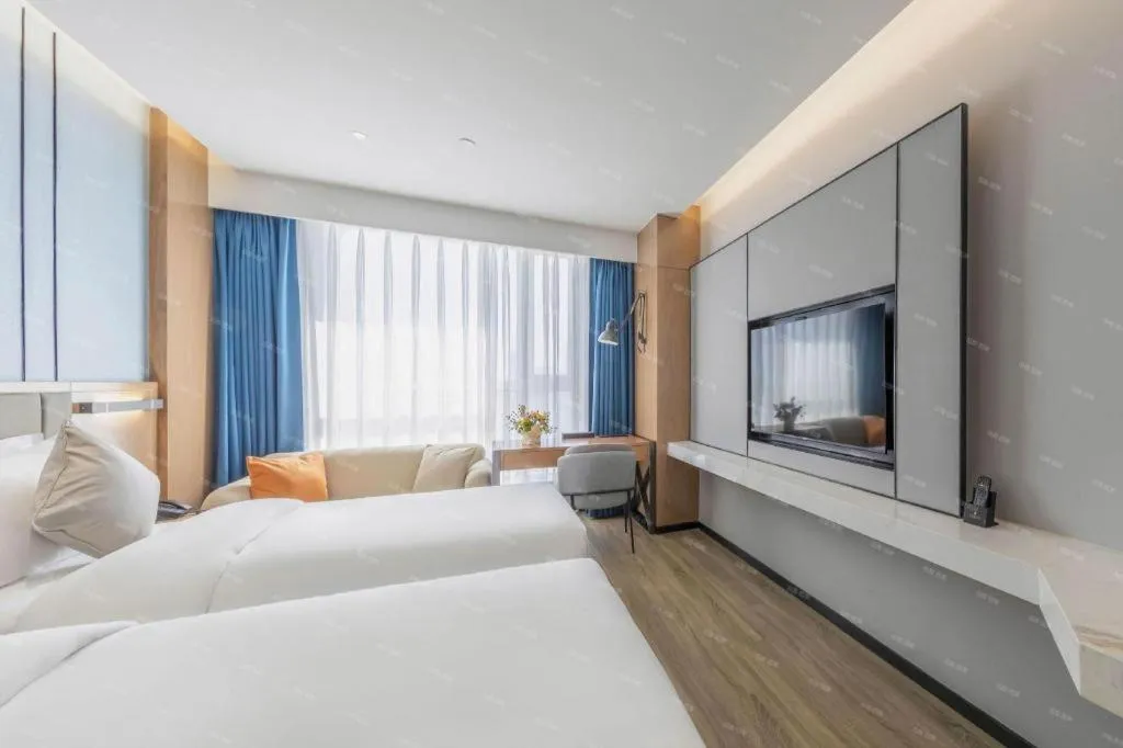 Bed in YUN-RAY Ambassador Hotel