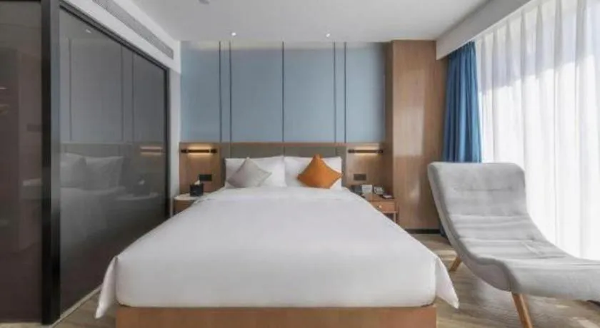 Bed in YUN-RAY Ambassador Hotel