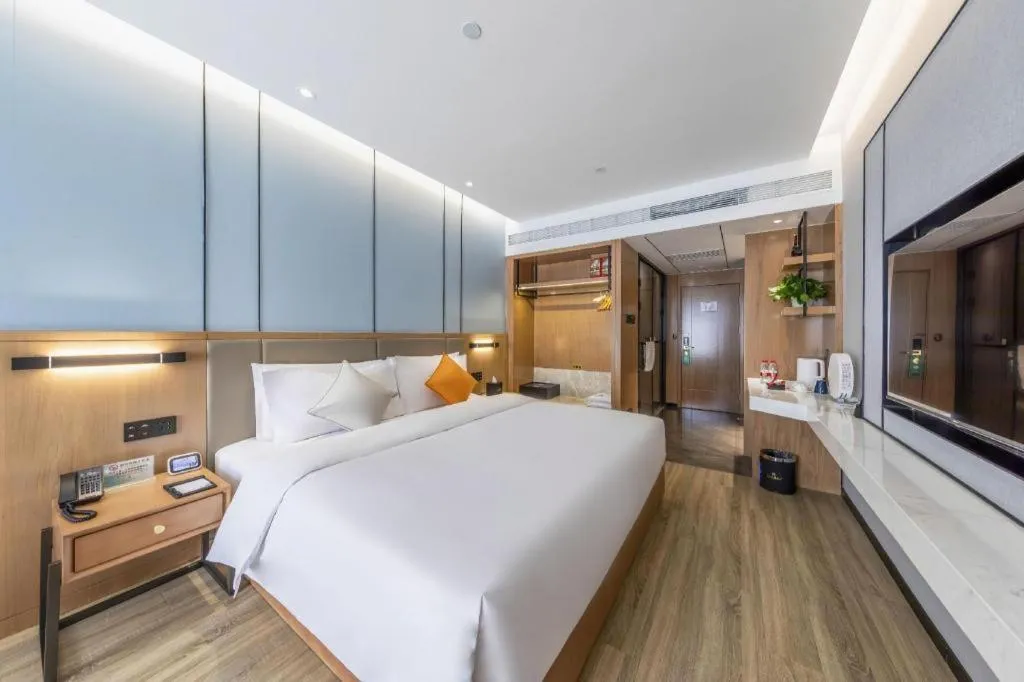 Bed in YUN-RAY Ambassador Hotel