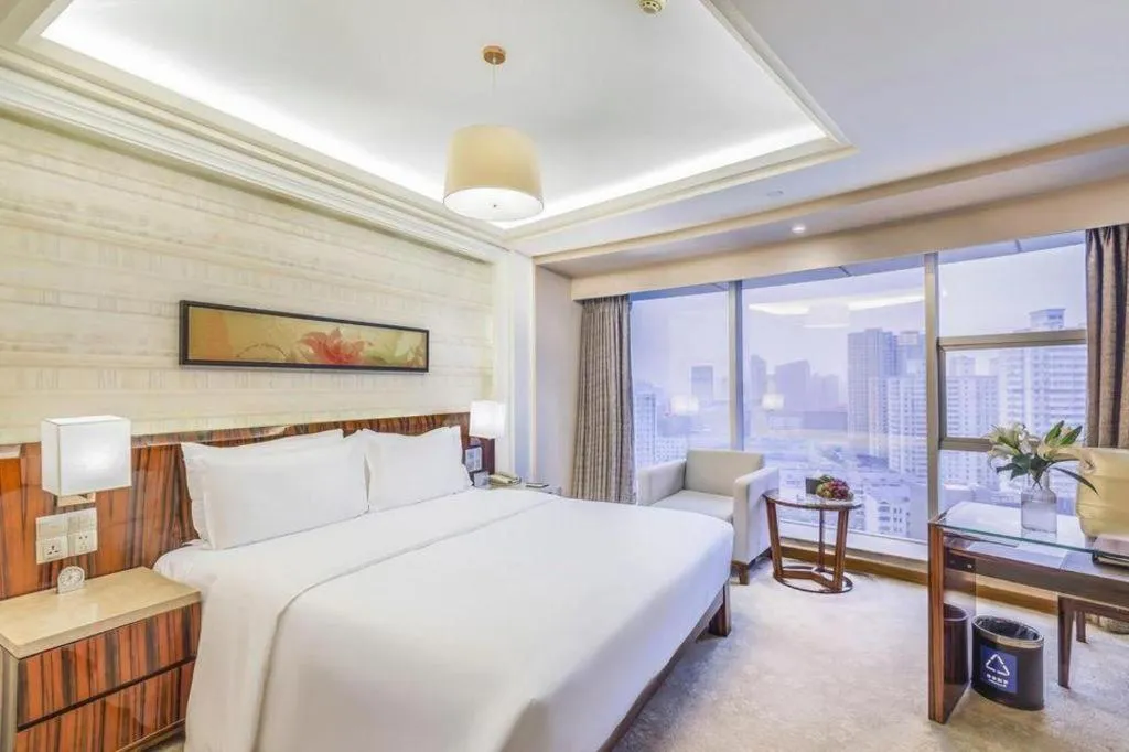 Bed in YUN-RAY Ambassador Hotel