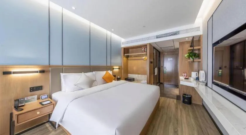 Bed in YUN-RAY Ambassador Hotel