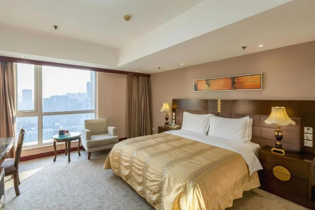 Bed in YUN-RAY Ambassador Hotel