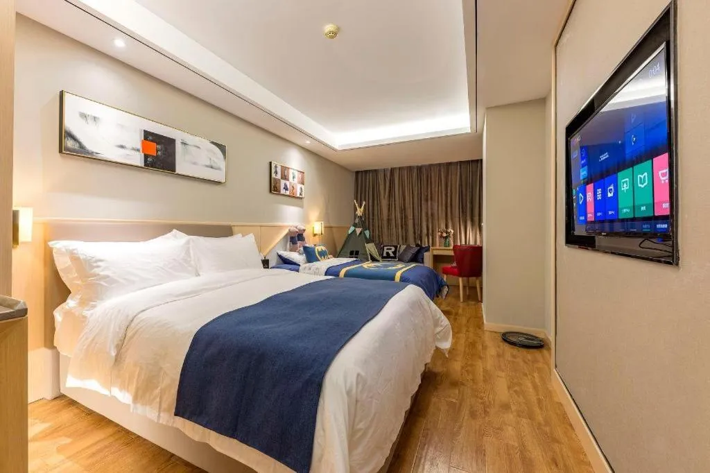 Bed in YUN-RAY Ambassador Hotel