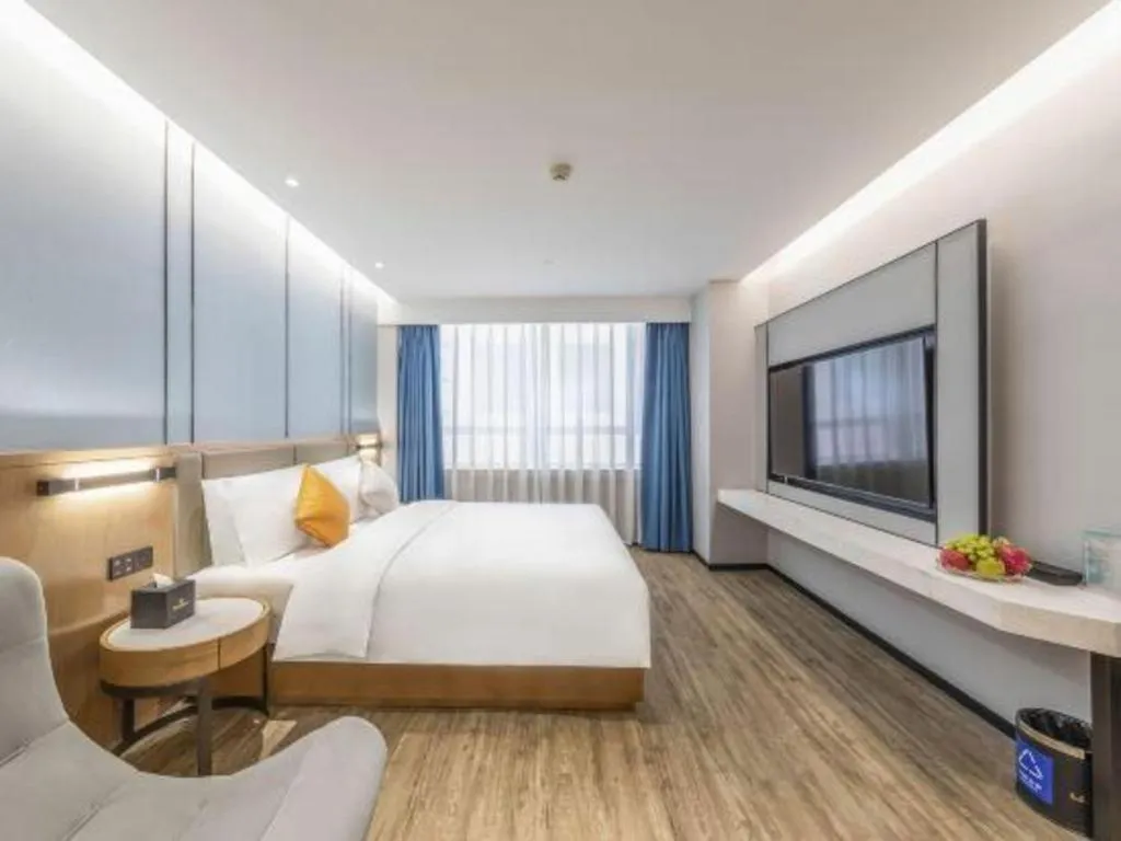 Bed in YUN-RAY Ambassador Hotel