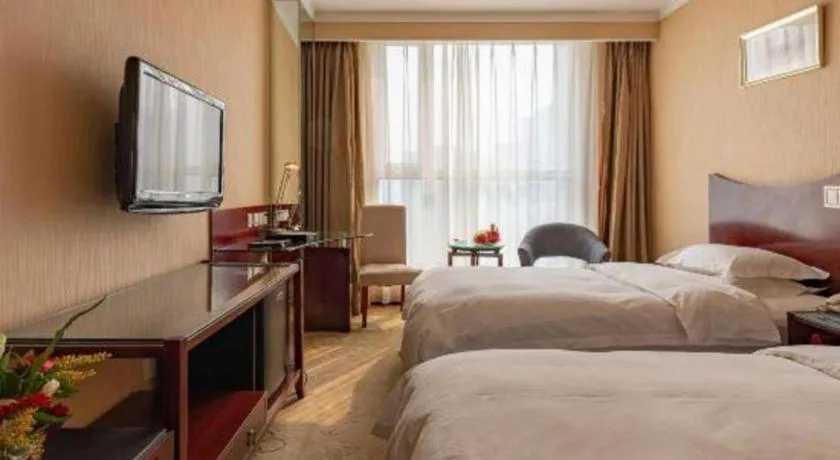 Bed in YUN-RAY Ambassador Hotel