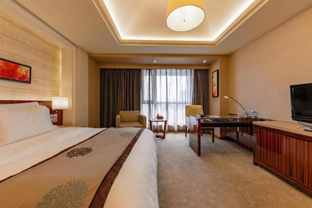 Bed in YUN-RAY Ambassador Hotel