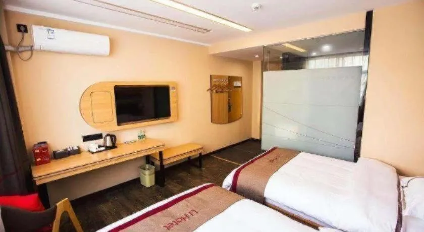 Bed in Thank Inn Hotel Guangdong Zhuhai Jiwan Hongqi Central Sqaure