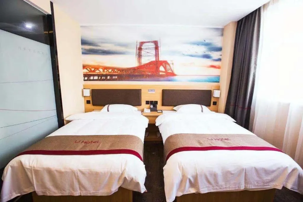 Bed in Thank Inn Hotel Guangdong Zhuhai Jiwan Hongqi Central Sqaure