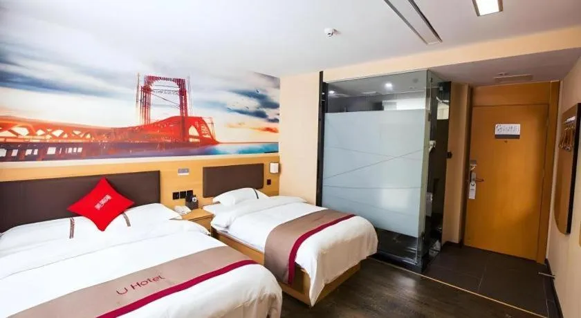 Bed in Thank Inn Hotel Guangdong Zhuhai Jiwan Hongqi Central Sqaure