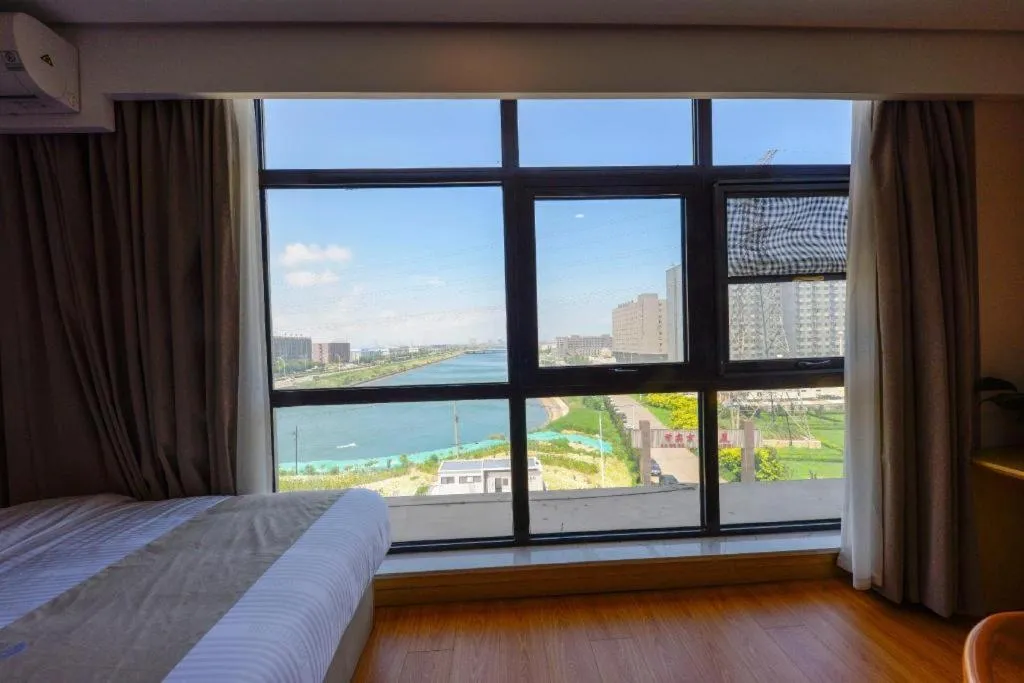 Bed in GreenTree Inn Express Hebei Tangshan Caofeidian Industrial Park 11 Plus Bus Station