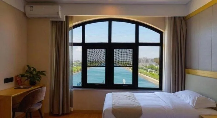 Bed in GreenTree Inn Express Hebei Tangshan Caofeidian Industrial Park 11 Plus Bus Station