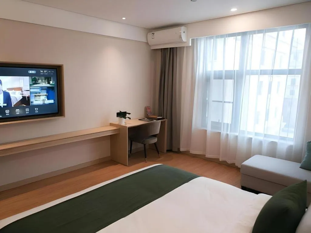 Bed in GreenTree Inn Express Hebei Tangshan Caofeidian Industrial Park 11 Plus Bus Station