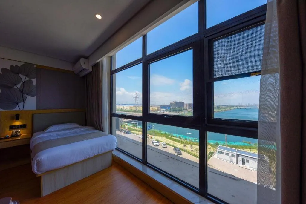 Bed in GreenTree Inn Express Hebei Tangshan Caofeidian Industrial Park 11 Plus Bus Station