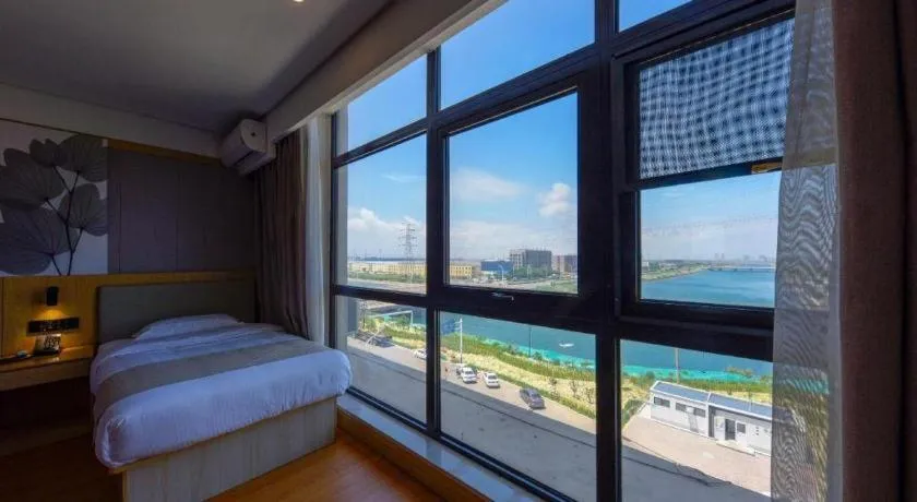 Bed in GreenTree Inn Express Hebei Tangshan Caofeidian Industrial Park 11 Plus Bus Station