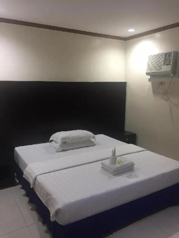 Bed in Jeamco Royal Hotel - Baybay