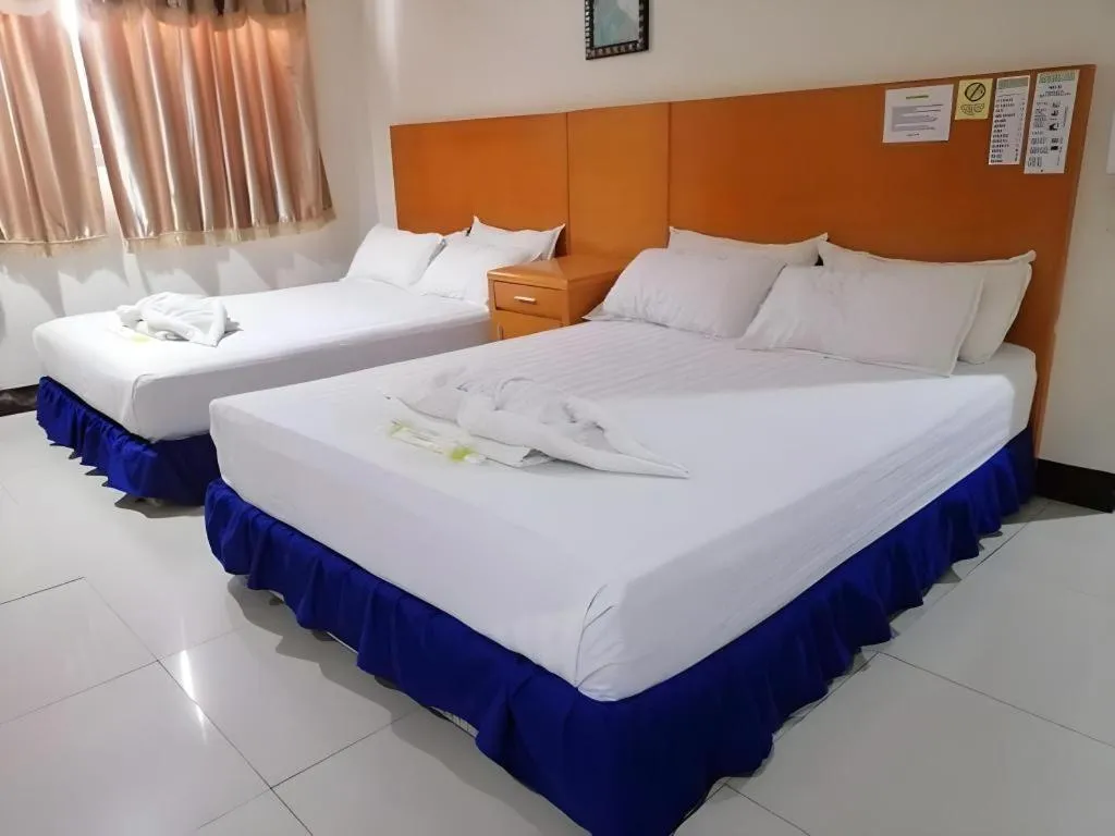 Bed in Jeamco Royal Hotel - Pasig
