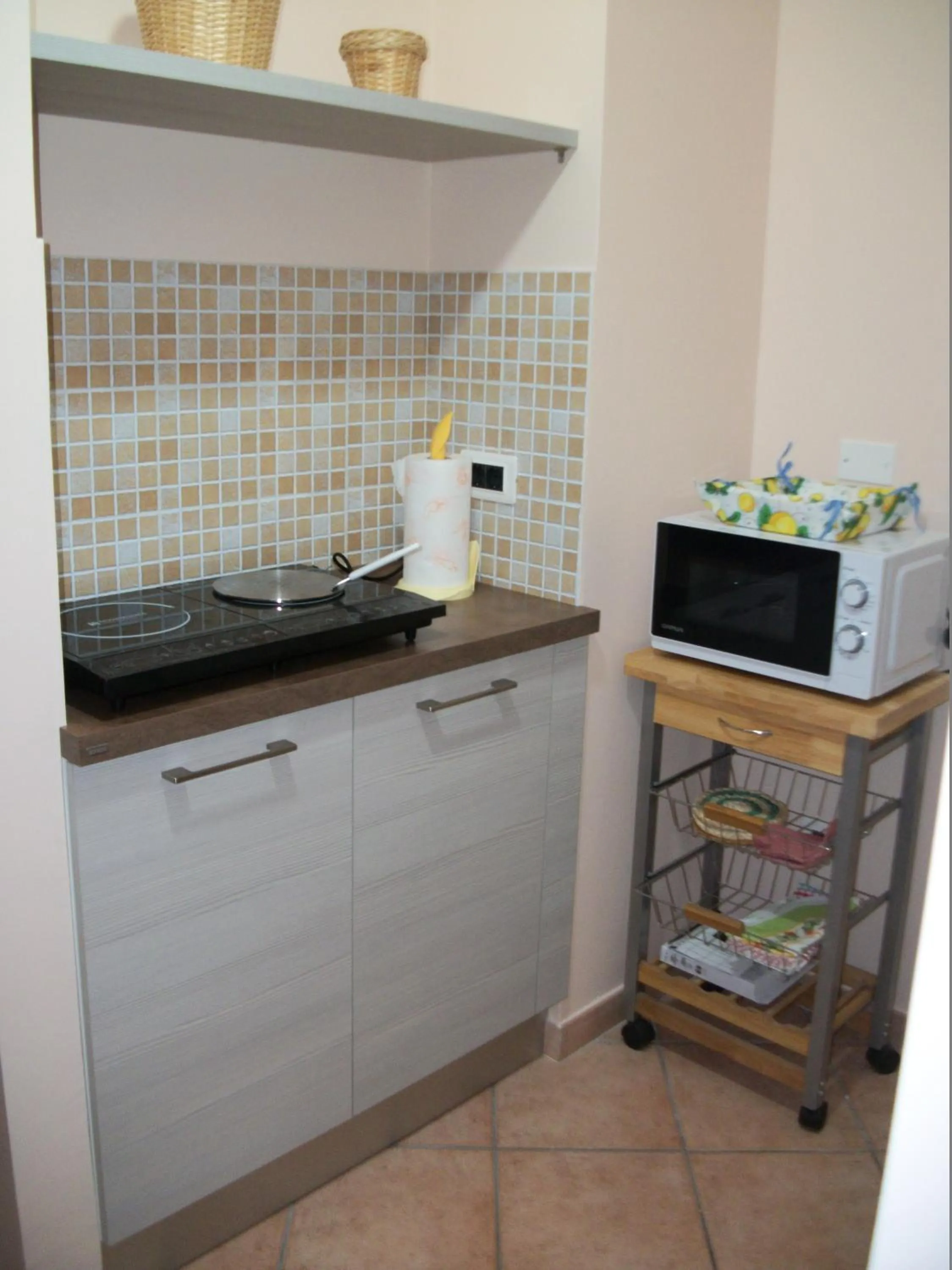 Kitchen or kitchenette in Le Poiane B&B Vacanze