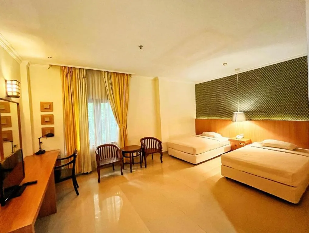 Bed in HOTEL SARI KURING INDAH