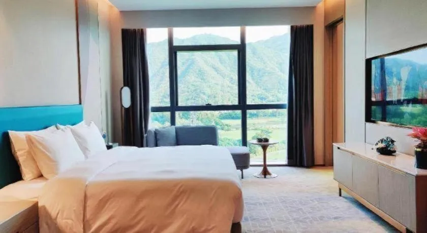 Bed in Zhuhai Hongsanyi Hotel