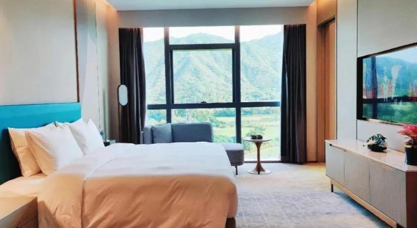 Bed in Zhuhai Hongsanyi Hotel