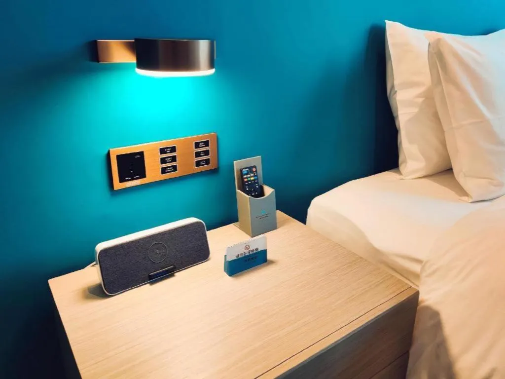 Bed in Zhuhai Hongsanyi Hotel