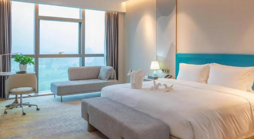 Bed in Zhuhai Hongsanyi Hotel