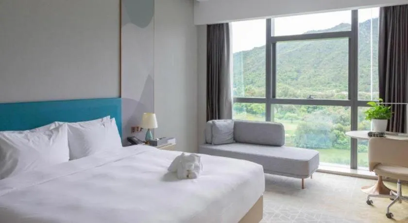 Bed in Zhuhai Hongsanyi Hotel