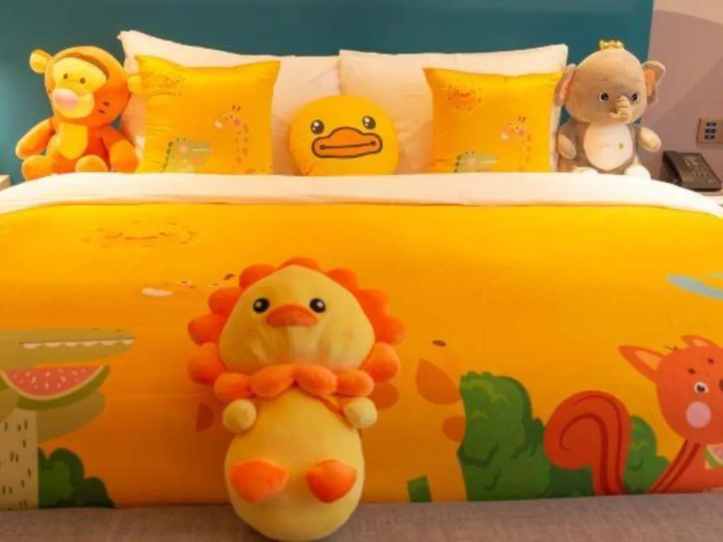 Bed in Zhuhai Hongsanyi Hotel