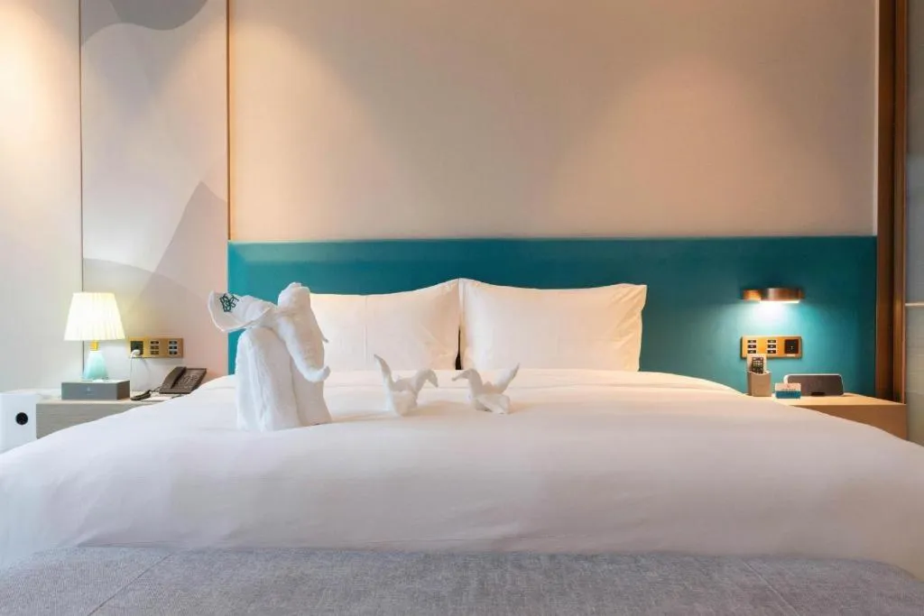 Bed in Zhuhai Hongsanyi Hotel