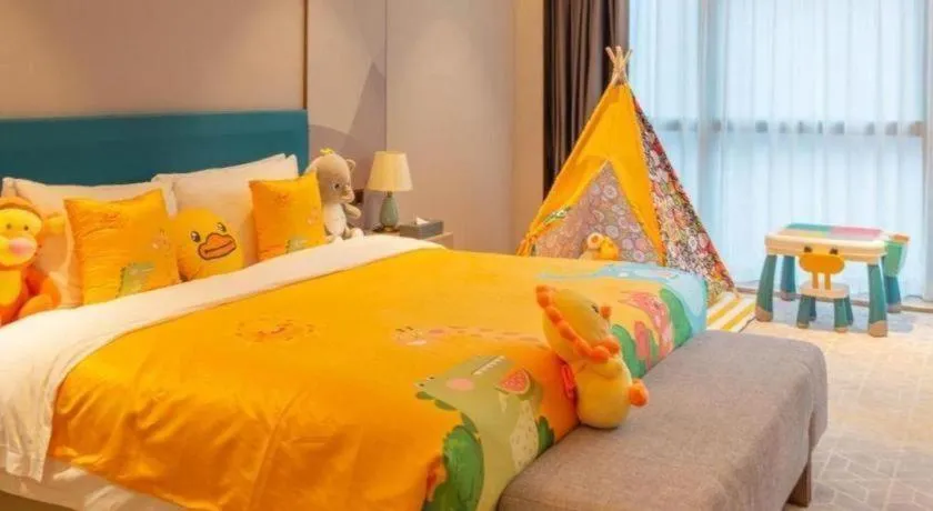 Bed in Zhuhai Hongsanyi Hotel