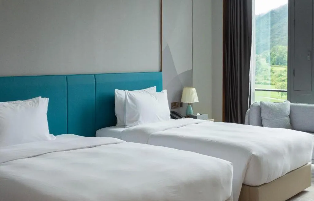 Bed in Zhuhai Hongsanyi Hotel