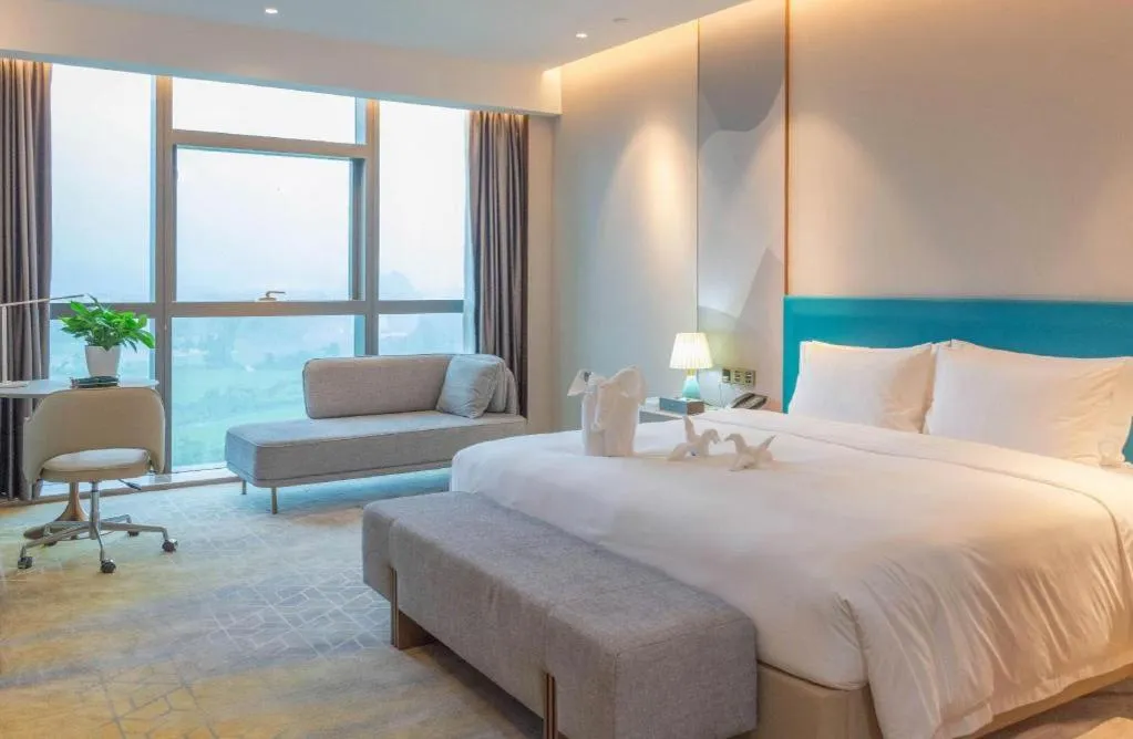 Bed in Zhuhai Hongsanyi Hotel