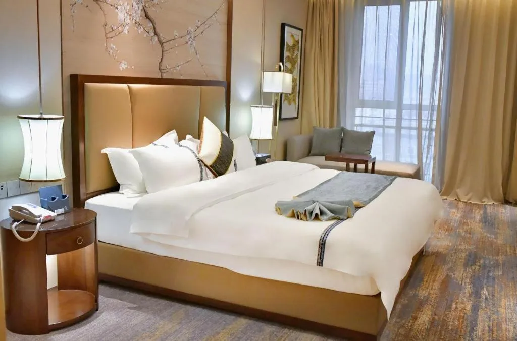 Bed in Qingdao Hualan Hotel