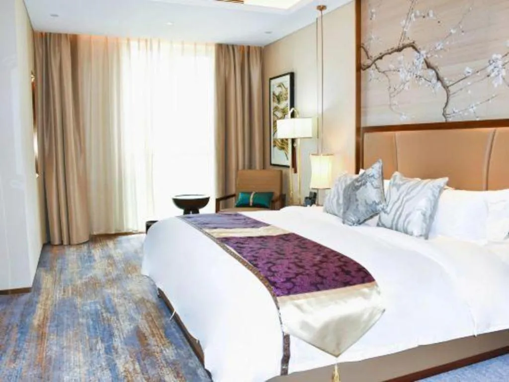 Bed in Qingdao Hualan Hotel