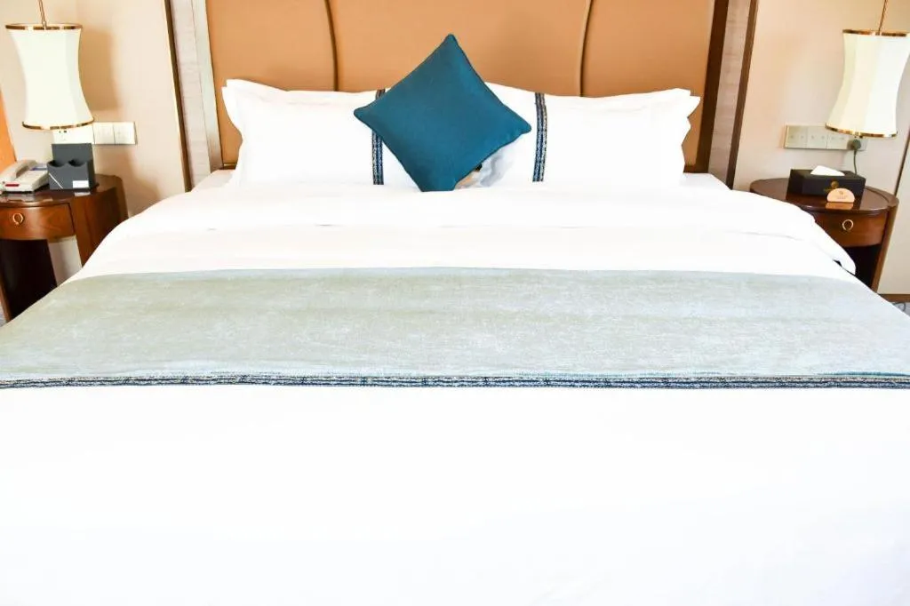 Bed in Qingdao Hualan Hotel